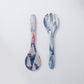 Mellow Monkey Race Day melamine salad servers featuring a nautical painting of sailboats on blue water. One server is a spoon, the other a fork.