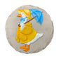 Mellow Monkey round resin stepping stone featuring a white goose in a yellow raincoat and blue umbrella wall plaque