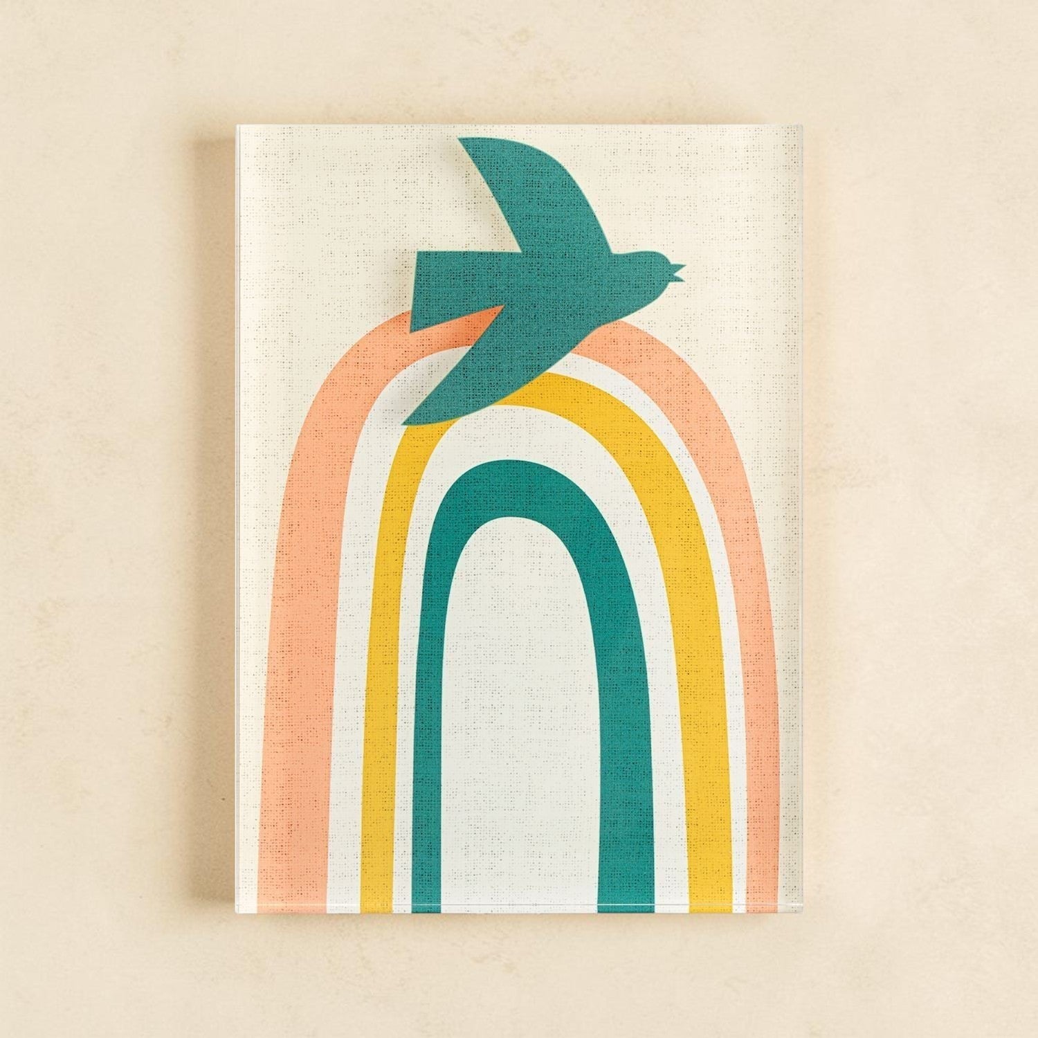 Mellow Monkey Together Tile acrylic wall art with a teal bird flying over a rainbow in peach, yellow, and teal.