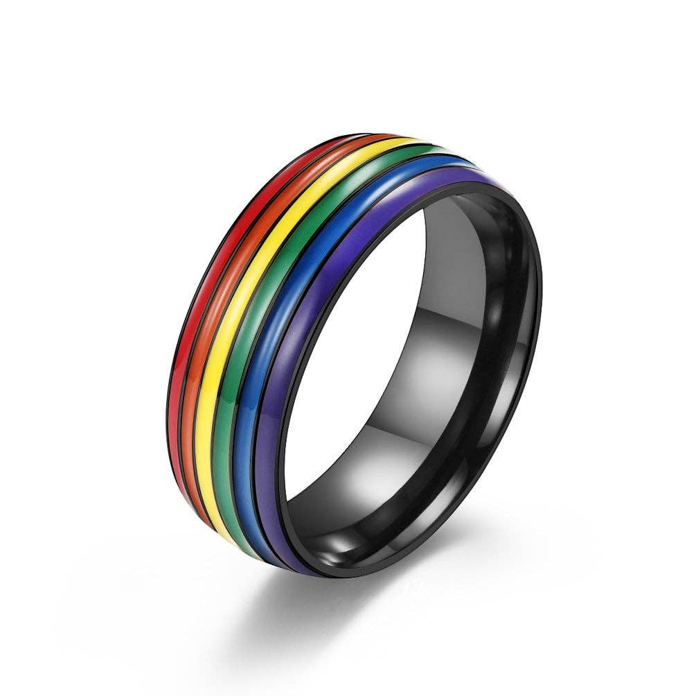 Mellow Monkey stainless steel ring featuring a vibrant rainbow striped design on a polished black band.