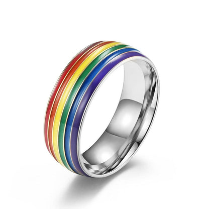 Mellow Monkey stainless steel ring featuring vibrant rainbow stripes and a polished silver finish.