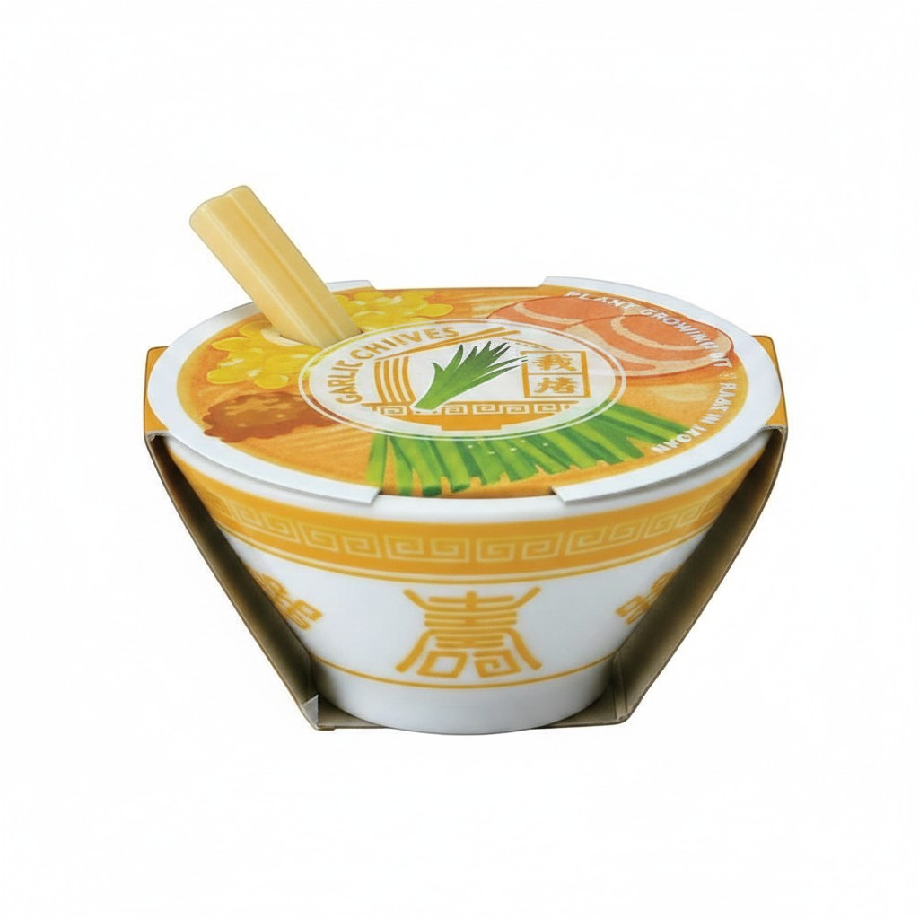 Mellow Monkey Ramen Garden garlic chives plant growing kit in a decorative ceramic bowl with tiny chopsticks