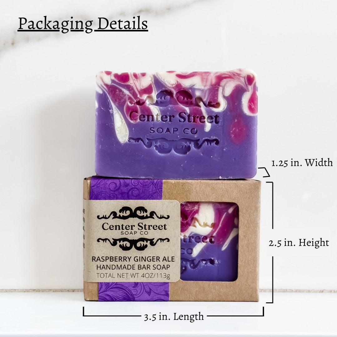 Mellow Monkey raspberry ginger ale handmade artisan soap bar in a kraft window box with purple and white swirl design