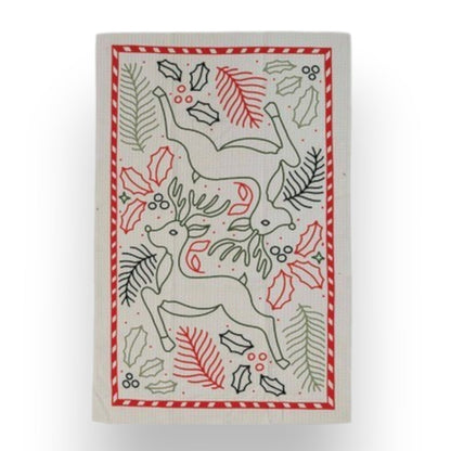 Mellow Monkey recycled microfibre tea towel featuring a festive reindeer, holly, and berry holiday pattern.