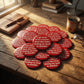 Mellow Monkey 1.25-inch round red pin-back button with white text reading I get most of my exercise shaking my head