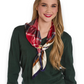 Mellow Monkey red tartan silky polyester scarf tied around the neck of a smiling woman in a dark green sweater