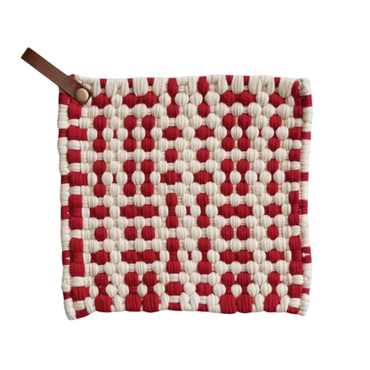Mellow Monkey 8-inch square crocheted pot holder in red and white with a brown leather hanging loop.