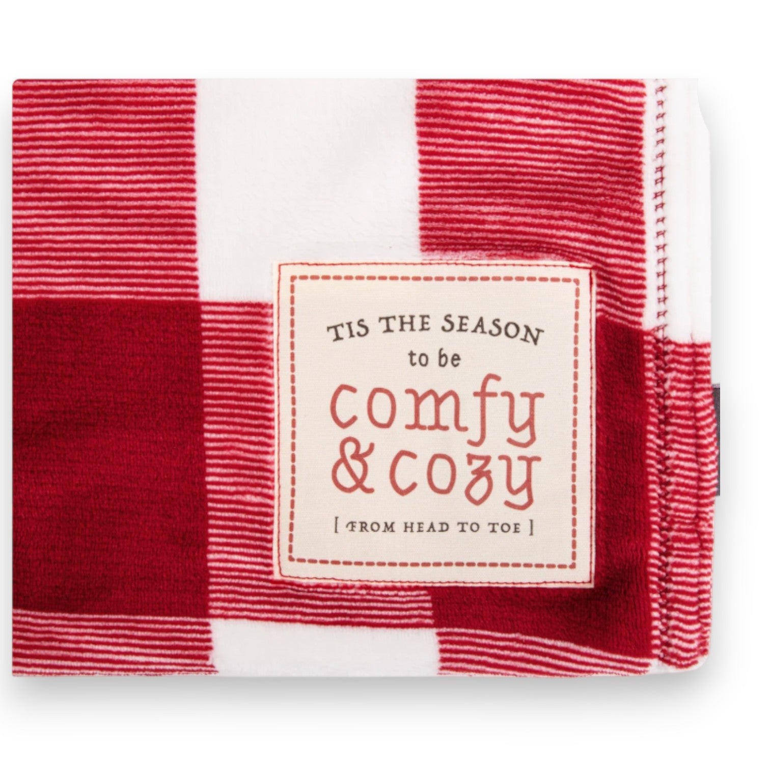 Mellow Monkey red and white plaid blanket with a stitched label reading Tis the Season to be Comfy and Cozy