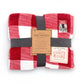 Mellow Monkey red and white plaid foot pocket blanket folded with product packaging and cozy branding labels.