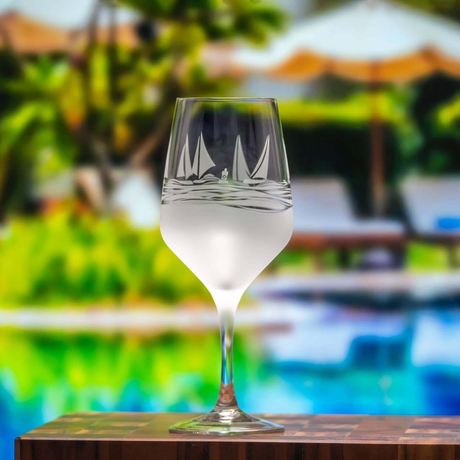Mellow Monkey Regatta wine glass featuring sand-etched sailboats and a frosted base, 19.5-ounce capacity.