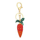 Mellow Monkey red and orange rhinestone carrot keychain with green enamel leaves and gold-tone hardware.