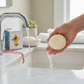 Mellow Monkey Richard Scarry First Snowfall triple milled soap bar with snowflake detail held under bathroom faucet