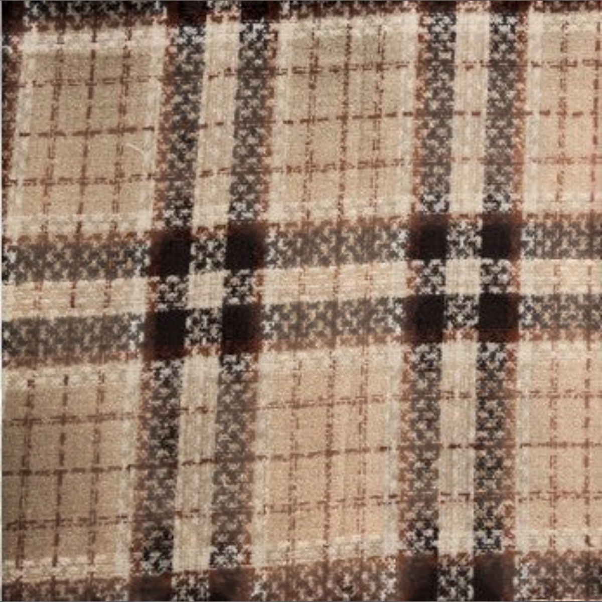 Mellow Monkey Rory classic plaid fringe scarf in soft brushed acrylic with a tan, brown, and cream checkered pattern.