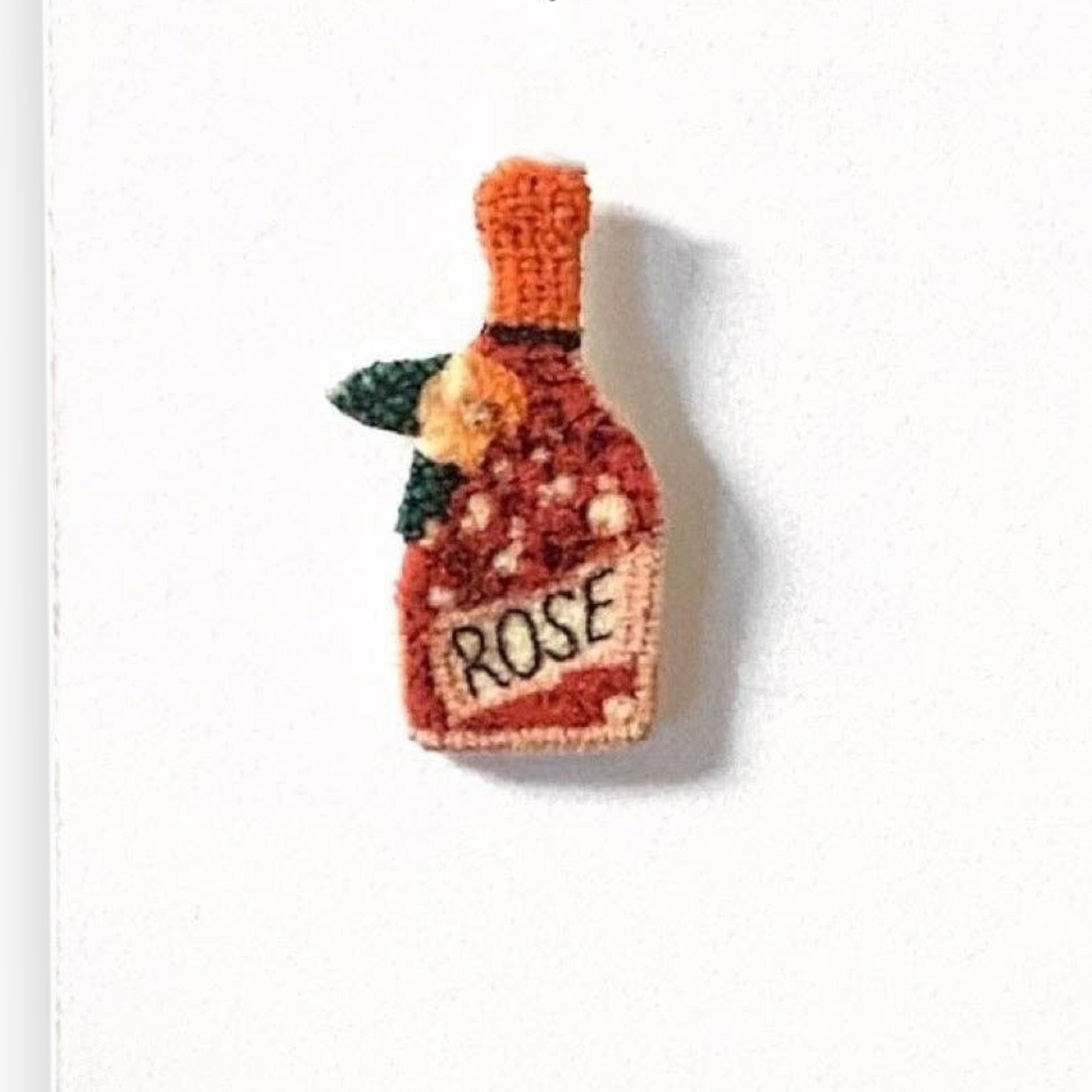 Mellow Monkey handmade rosé wine bottle stud earrings with embroidered detail and hypoallergenic stainless steel posts
