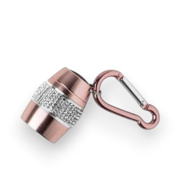Mellow Monkey rose gold keychain flashlight with crystal accents and carabiner clip.