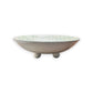 Mellow Monkey 18-inch round bowl crafted from iridescent capiz shells with decorative ball feet for coastal decor.