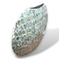 Mellow Monkey round vase hand-inlaid with soft green iridescent capiz shells in a textured coastal style