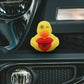 Mellow Monkey yellow rubber duck with a winking eye holding a red heart that says I Ducking Love You on a car bumper