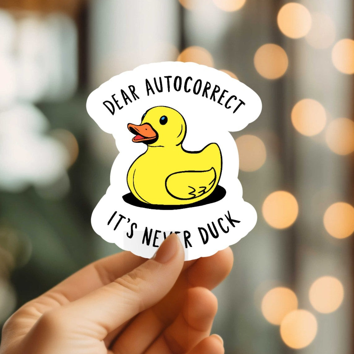Mellow Monkey waterproof vinyl sticker featuring a yellow rubber duck with the text Dear Autocorrect It's Never Duck