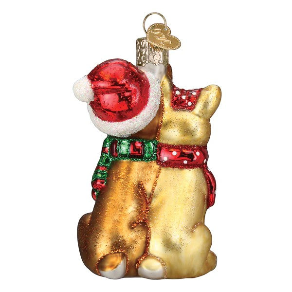Mellow Monkey Rudolph and Clarice blown glass holiday ornament with red Santa hat and scarves.