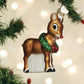 Mellow Monkey Rudolph The Red-Nosed Reindeer blown glass ornament with a green wreath and red nose.