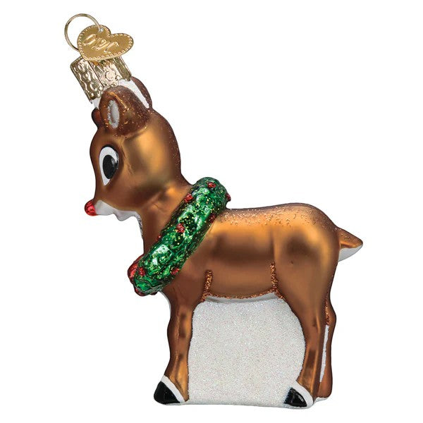 Mellow Monkey Rudolph the Red-Nosed Reindeer blown glass ornament with a green wreath and red berries.
