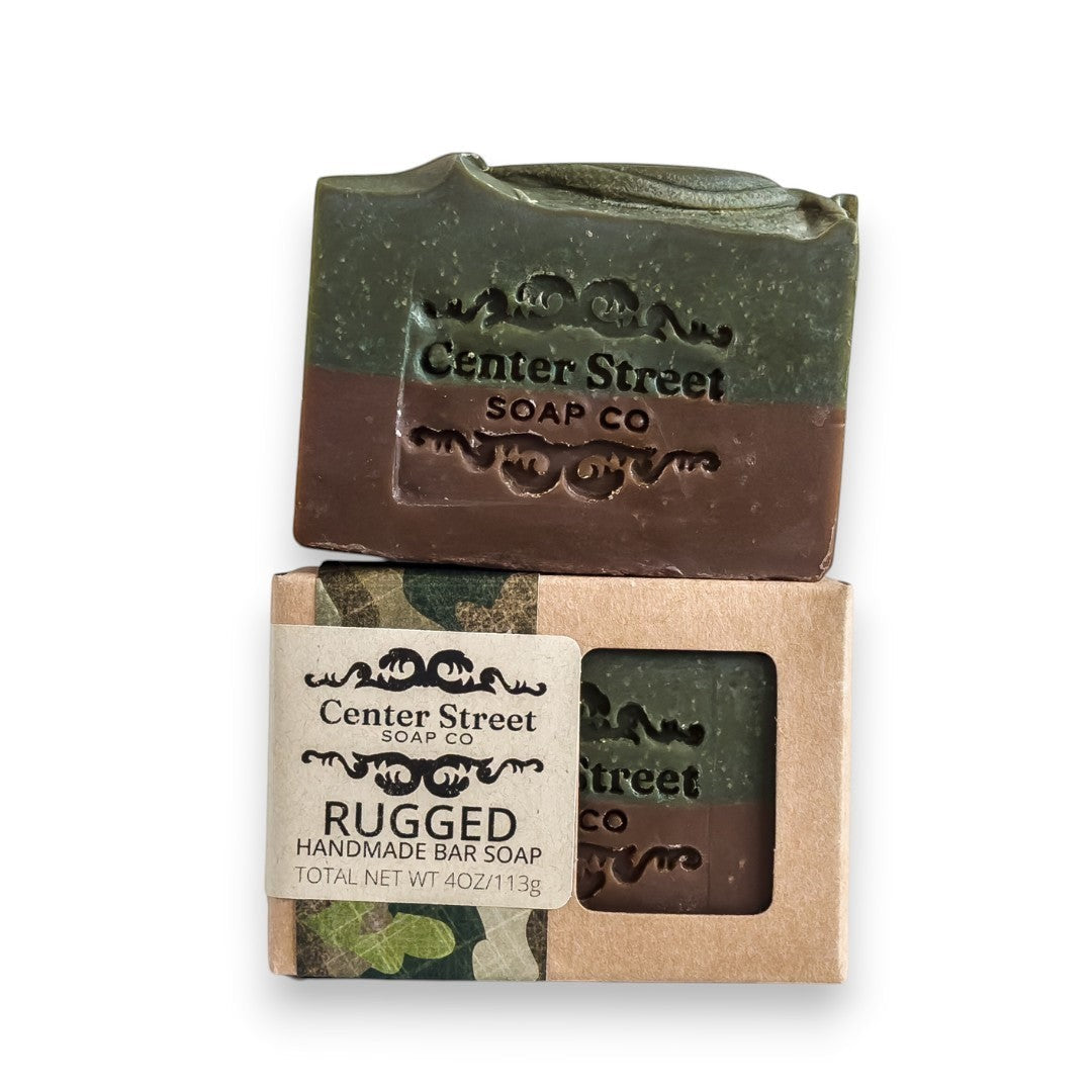 Mellow Monkey Rugged handmade vegan bar soap, 4oz, with green and brown layers and embossed logo.