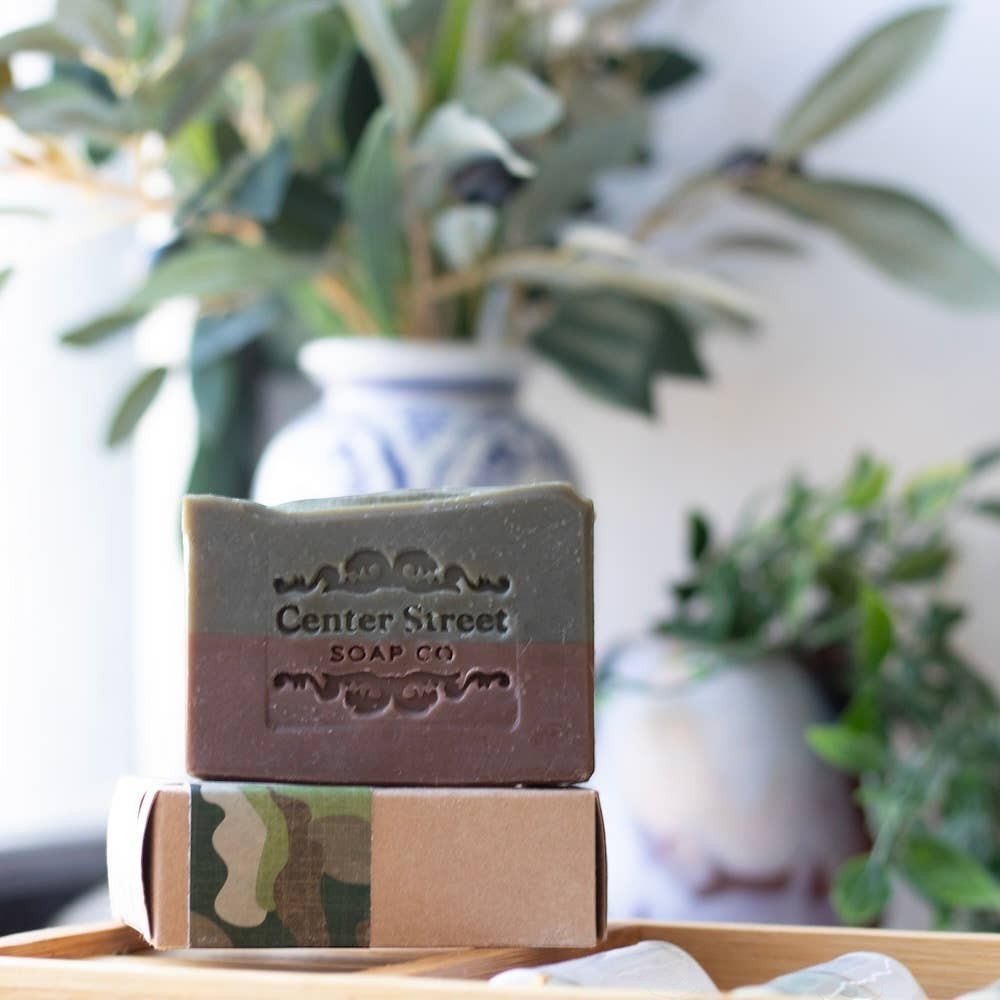 Mellow Monkey Rugged vegan handmade bar soap for men, 4-oz. Two-tone green and brown bar with embossed logo.