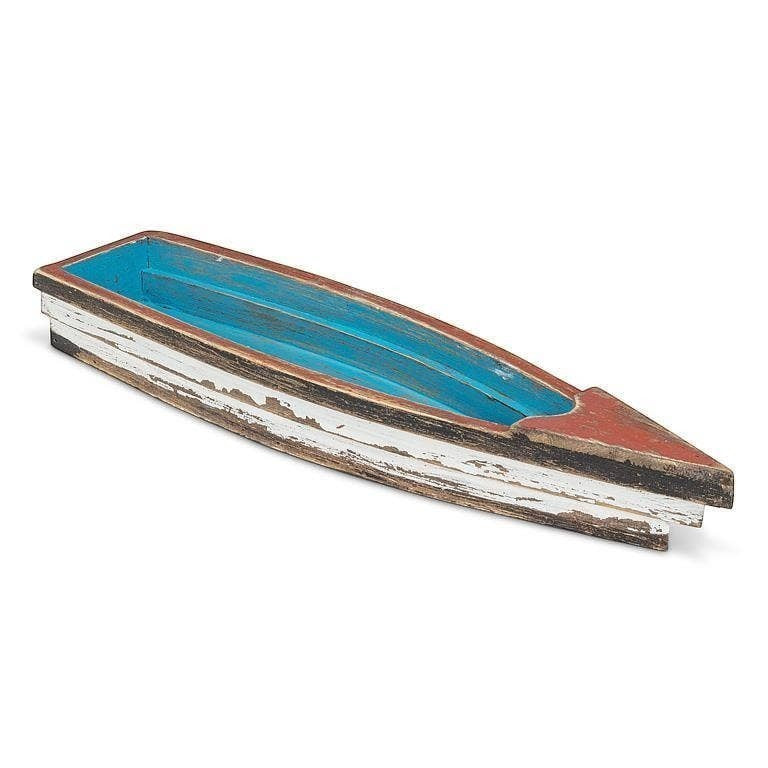 Mellow Monkey rustic wooden boat with distressed blue interior and white exterior. Coastal decor.