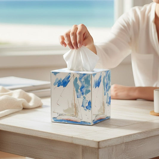Mellow Monkey papier mache tissue box cover featuring a sailboat decoupage design on a white wooden table.