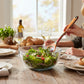 Mellow Monkey Marrakesh Collection layered birch salad serving utensil set with colorful striped handle.