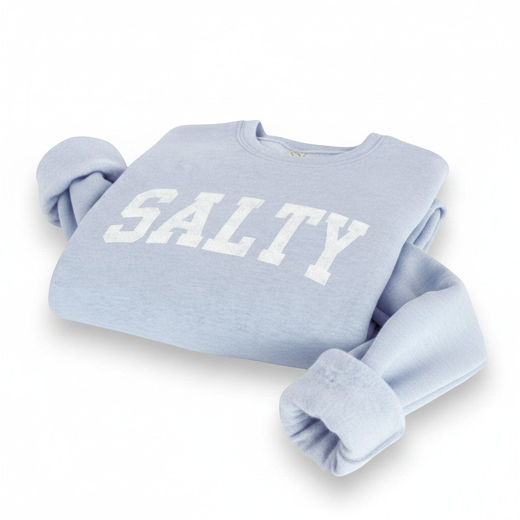 Mellow Monkey light blue crewneck sweatshirt with white "SALTY" graphic. Soft fabric, relaxed fit.