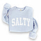 Mellow Monkey light blue crewneck sweatshirt with white "SALTY" graphic. Relaxed fit, soft fabric.