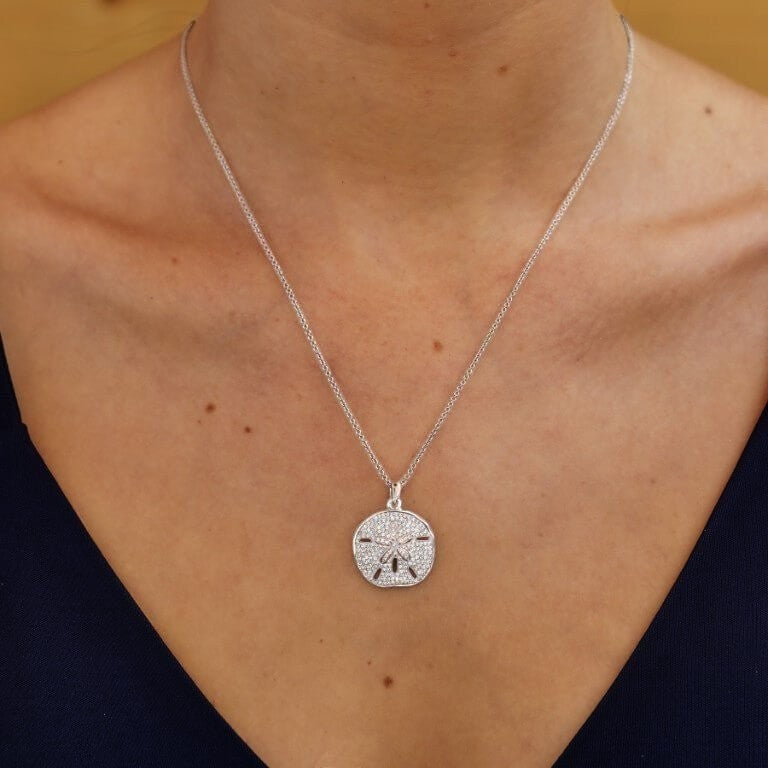 Mellow Monkey Sand Dollar pendant necklace with Swarovski crystals on a 20-inch sterling silver chain.