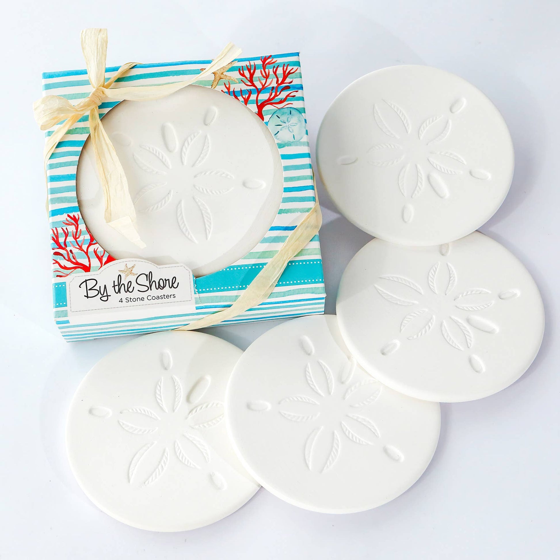 Mellow Monkey By the Shore set of four round white sandstone coasters with embossed sand dollar designs