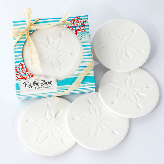 Mellow Monkey By the Shore set of four round white sandstone coasters with embossed sand dollar designs