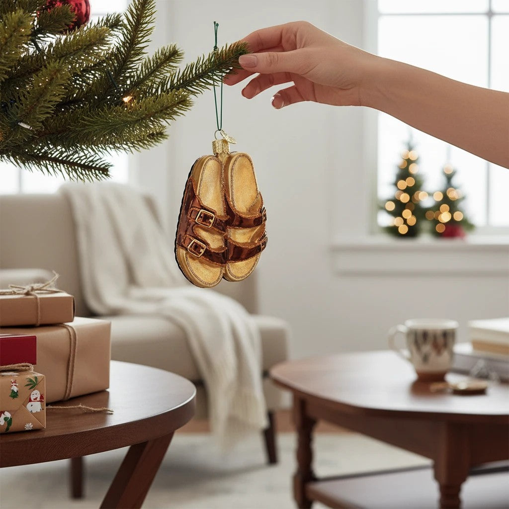 Mellow Monkey Old World Christmas blown glass sandal ornament, 4-inch, with gold glitter and brown straps.