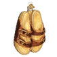 Mellow Monkey Old World Christmas blown glass ornament shaped like gold and brown double-strap sandals with buckles.