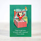 Mellow Monkey sarcastic Christmas card featuring a vintage-style illustration of a woman popping out of a gift box.