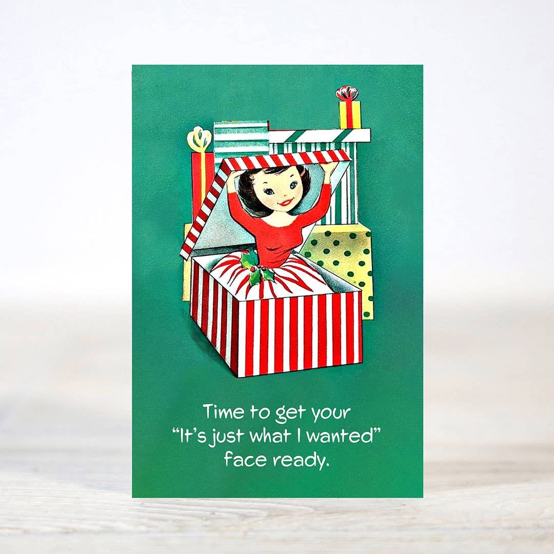 Mellow Monkey sarcastic Christmas card featuring a vintage-style illustration of a woman popping out of a gift box.