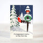 Mellow Monkey sarcastic Christmas card featuring a snowy winter scene with a lamp post and a red house at night.