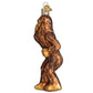 Mellow Monkey Sasquatch Old World Christmas blown glass ornament, brown with glitter accents, depicting Bigfoot.