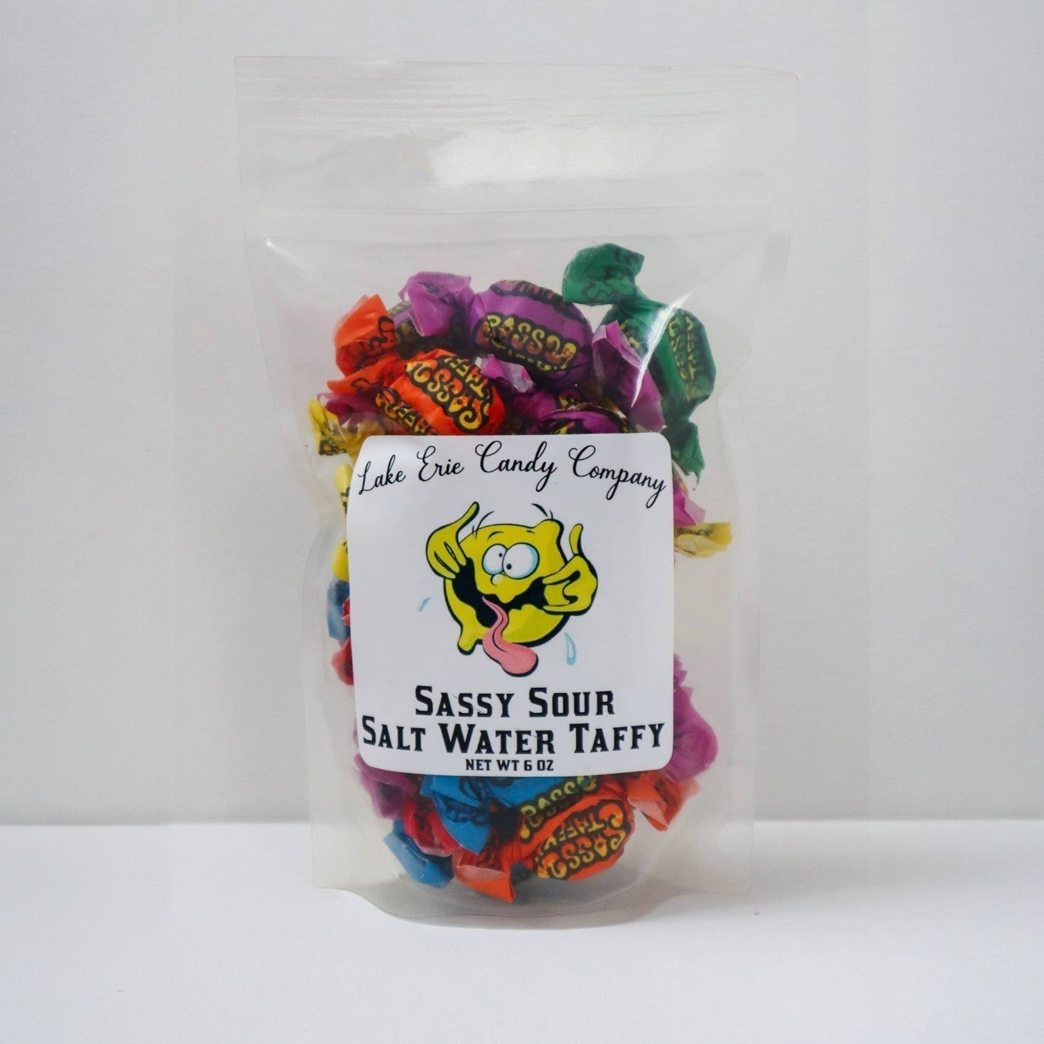Mellow Monkey Sassy Sour Salt Water Taffy in a 6-oz bag, featuring assorted fruit flavors like lemon, orange, and grape.