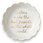 Mellow Monkey white ceramic scallop trinket tray with gold lettering that reads "Sisters make the best friends in the whole world."