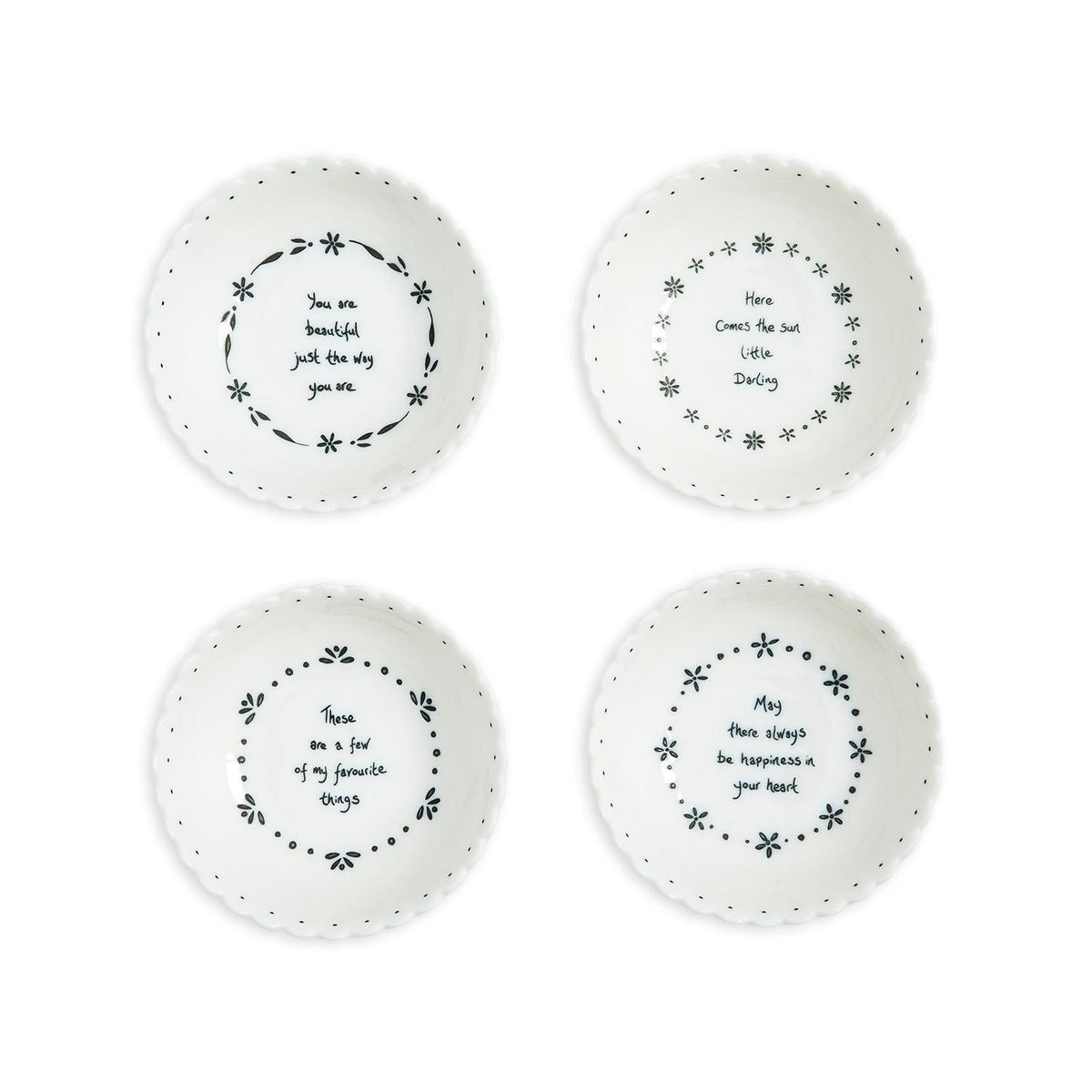 Mellow Monkey set of four white porcelain bowls with scalloped edges and inspiring messages in black text.