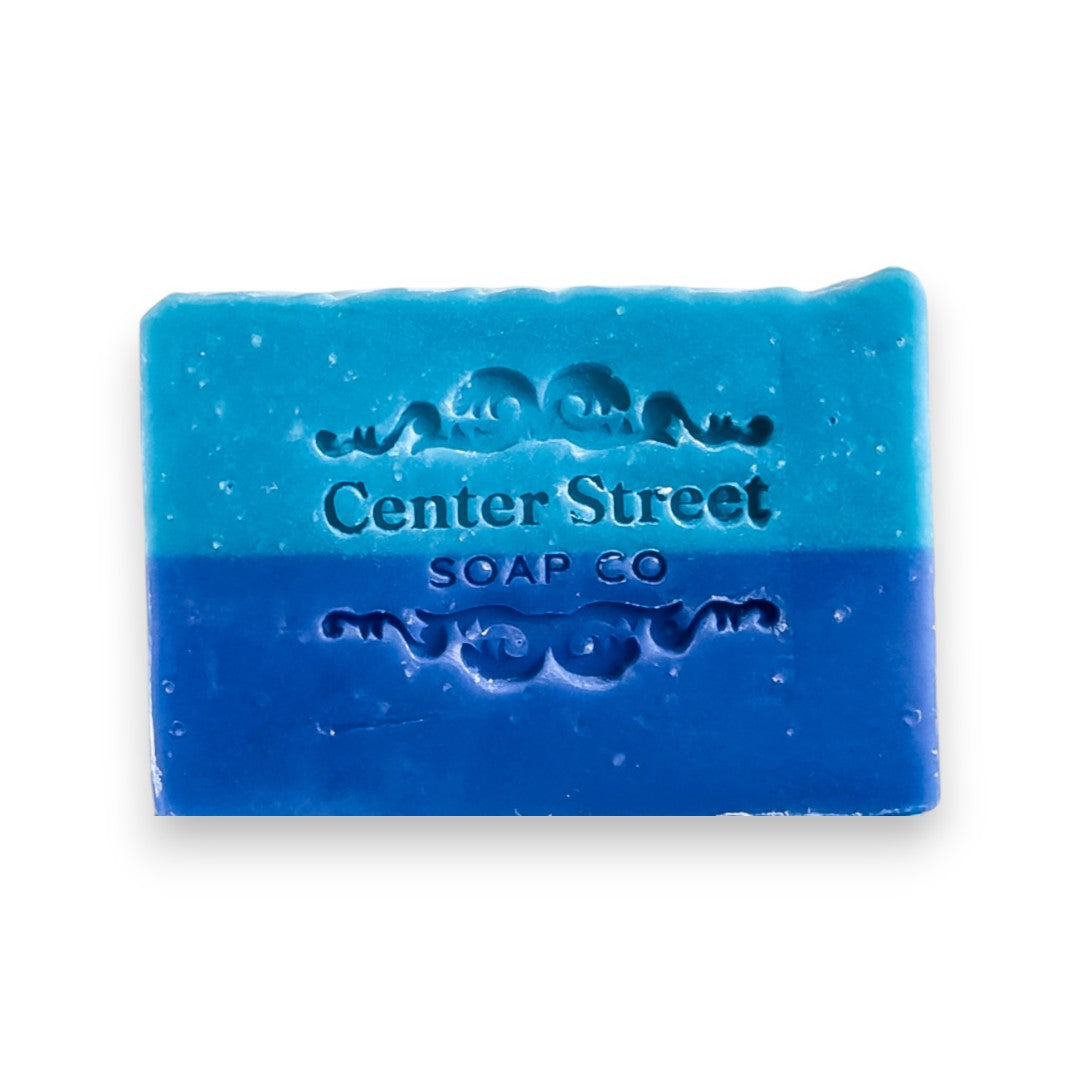 Mellow Monkey Sea Captain handmade vegan bar soap, blue ombre with embossed logo. For face and body.