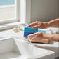 Mellow Monkey Sea Captain vegan handmade bar soap, 4-oz, with blue and teal layers and embossed logo.
