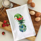 Mellow Monkey white cotton flour sack towel featuring a festive sea glass pineapple wearing a green and red elf hat.