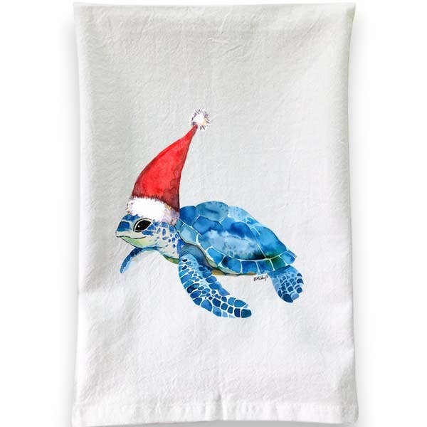 Mellow Monkey white cotton flour sack towel featuring a watercolor blue sea turtle wearing a festive red Santa hat.