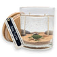 Mellow Monkey Sea Turtle gel candle with sand, seashells, and double wicks in a glass jar with a wooden lid.